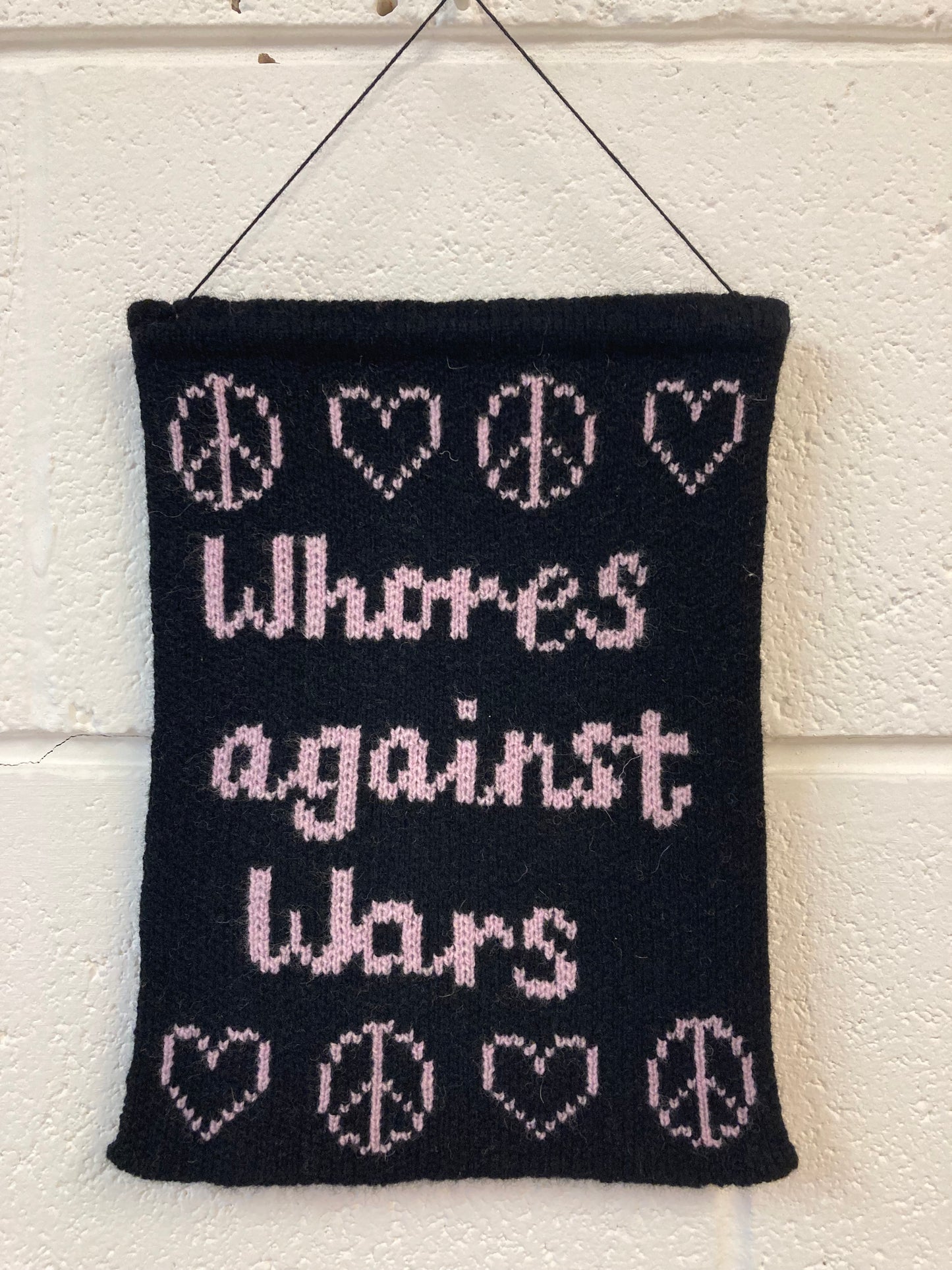 Whores against Wars - wall banner